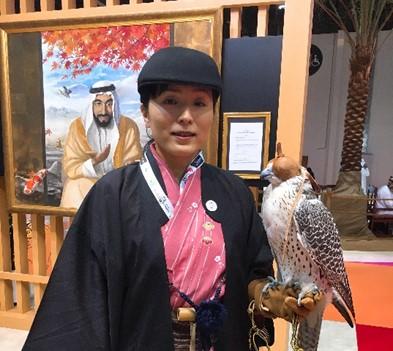 Suwa Falconer Otsuka introducing Japanese falconry (in front of the portrait of the late Sheikh Zayed)